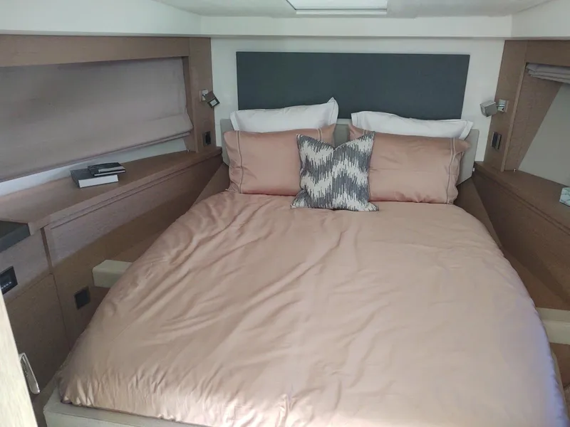 Slide: The Image of Luxurious bedroom interior of 2020 Prestige 520S yacht with elegant bedding and modern design. - 34
