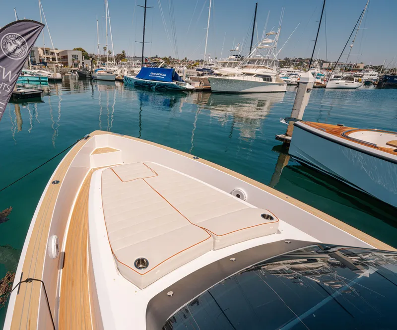 Slide: The Image of 2022 Pardo Yachts 38 docked in a marina, showcasing sleek design and luxury features. - 11