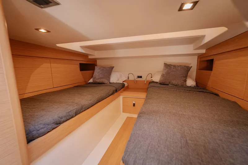 Slide: The Image of Cabin interior of 2022 Pardo Yachts 38 with twin beds and modern design. - 35