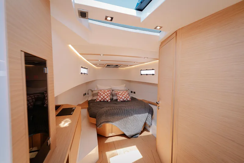 Slide: The Image of Luxurious interior of 2022 Pardo Yachts 38, featuring a cozy bedroom with modern design. - 37