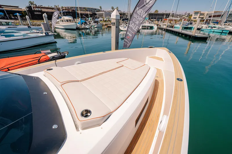 Slide: The Image of 2022 Pardo Yachts 38 at marina, featuring sleek deck design and luxurious seating. - 40