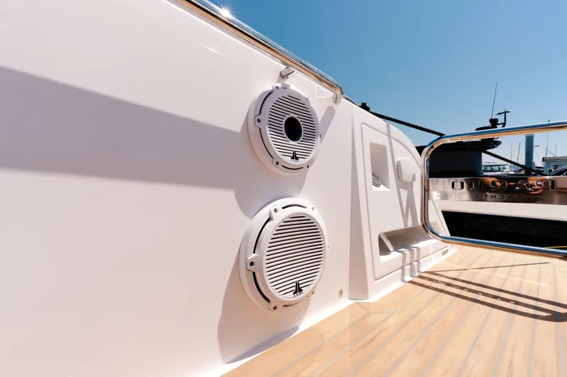 Slide: The Image of 2022 Pardo Yachts 38 deck with speakers and sleek design. - 20