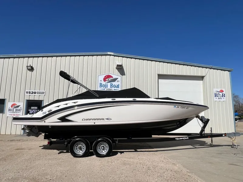 Slide: The Image of 2011 Chaparral 264 Sunesta boat on trailer outside Boji Boat Brokers building. - 38