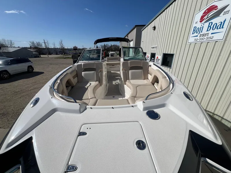 Slide: The Image of 2011 Chaparral 264 Sunesta boat with spacious seating, displayed at Boji Boat Brokers. - 7