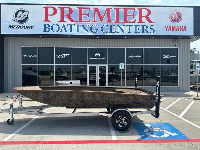Slide: The Image of 2025 Xpress HD16DBX boat on trailer at Premier Boating Centers. - 1