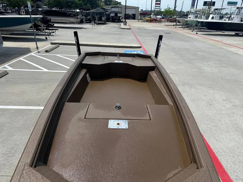 Slide: The Image of 2025 Xpress HD16DBX boat displayed in a dealership parking lot. - 15