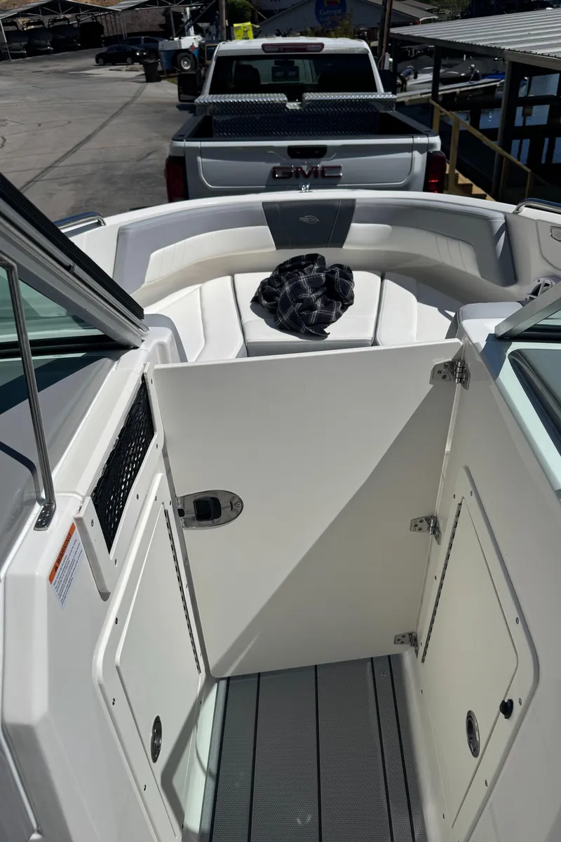 Slide: The Image of Interior of a 2024 Chaparral 21 SSi boat, view towards the bow. - 23