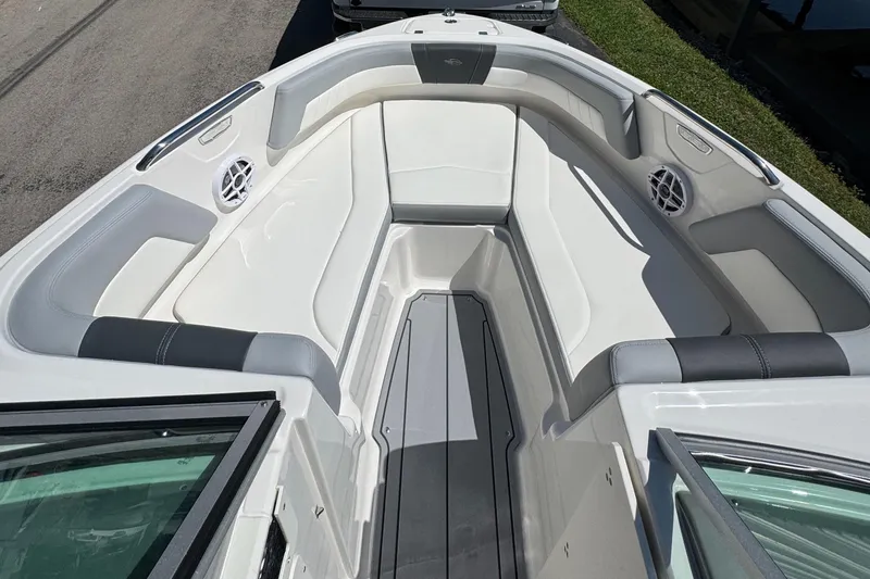 Slide: The Image of Interior view of 2024 Chaparral 21 SSi boat with gray upholstery. - 29