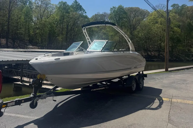Slide: The Image of 2024 Chaparral 21 SSi boat on trailer outdoors. - 3