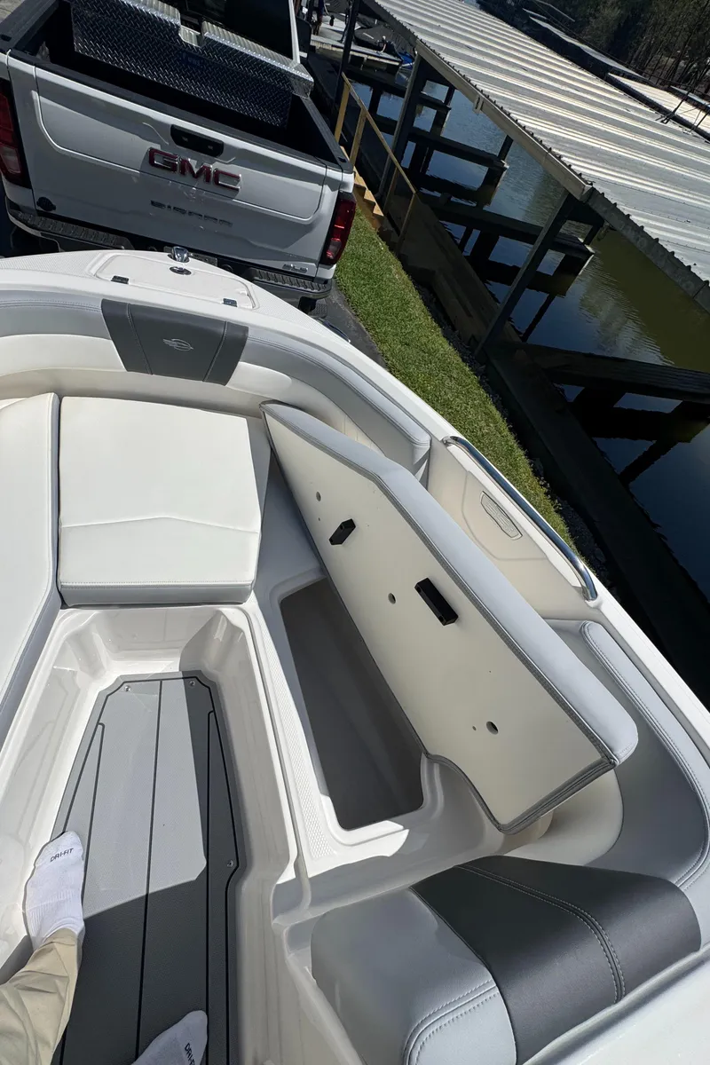 Slide: The Image of Interior of 2024 Chaparral 21 SSi with storage and seating. - 30