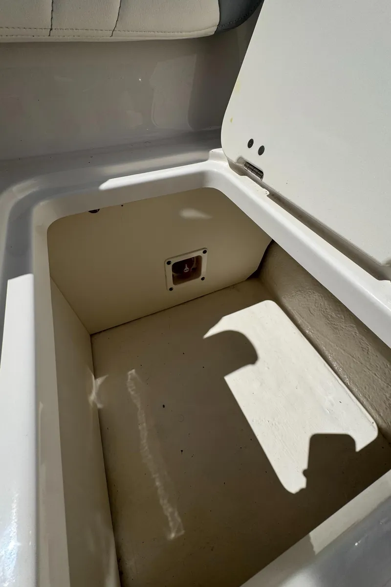 Slide: The Image of Storage compartment in 2024 Chaparral 21 SSi boat. - 34