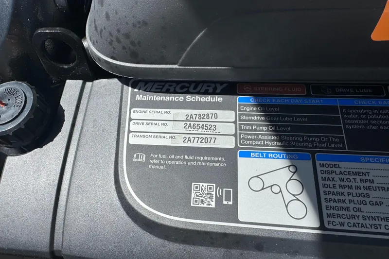 Slide: The Image of Maintenance schedule sticker on a Mercury engine, serial numbers visible. - 36