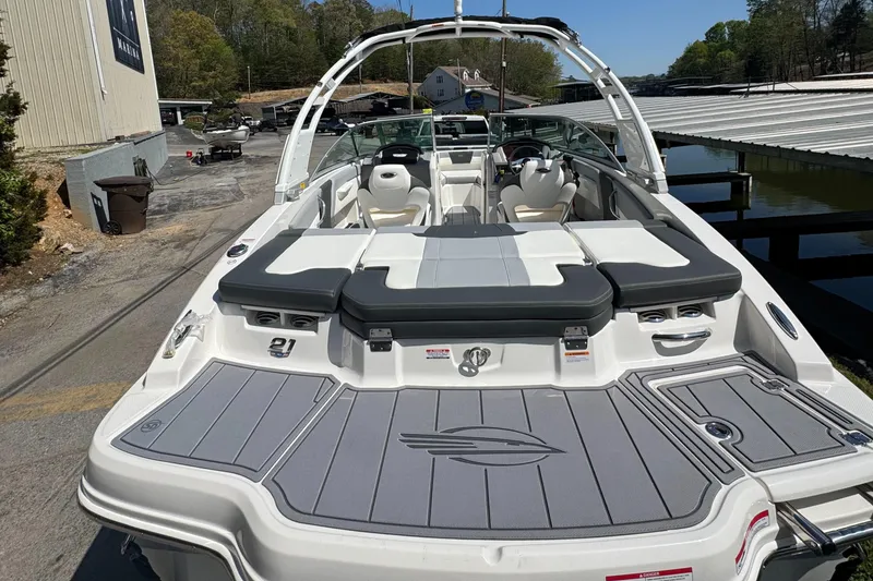 Slide: The Image of 2024 Chaparral 21 SSi boat at dock, rear view. - 6