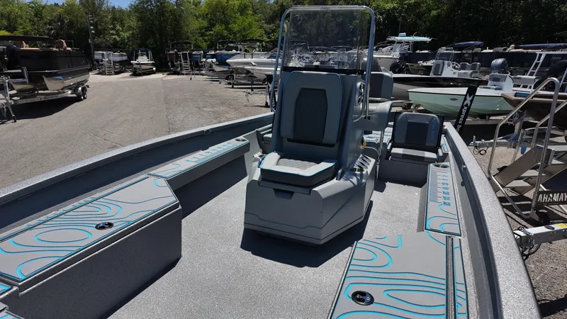 Slide: The Image of 2025 Xpress H22B boat with sleek design, spacious deck, and modern seating. - 28
