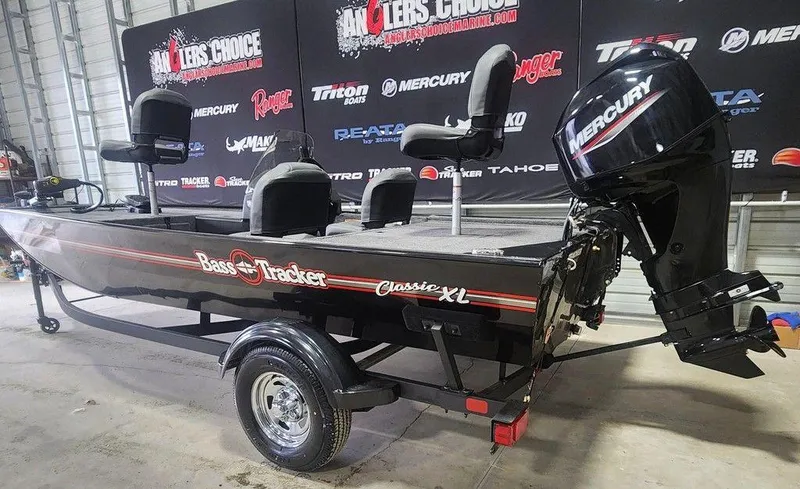 Slide: The Image of 2025 Tracker BASS TRACKER® Classic XL boat with Mercury engine in showroom. - 3
