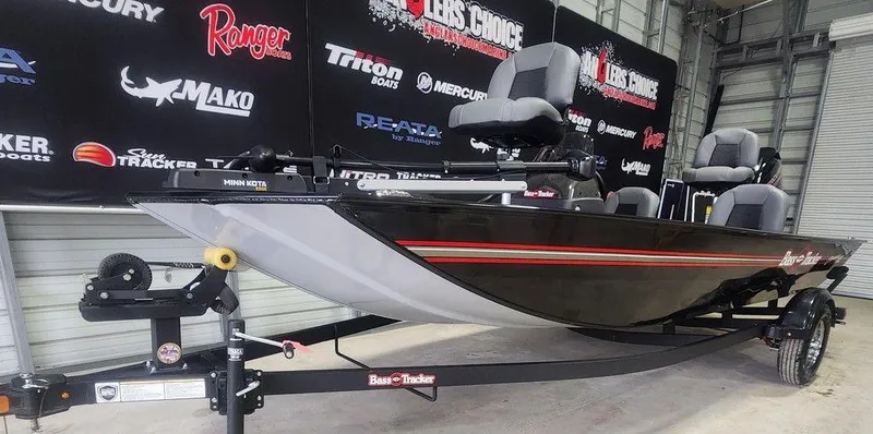 Slide: The Image of 2025 Tracker BASS TRACKER® Classic XL boat on trailer in showroom. - 9