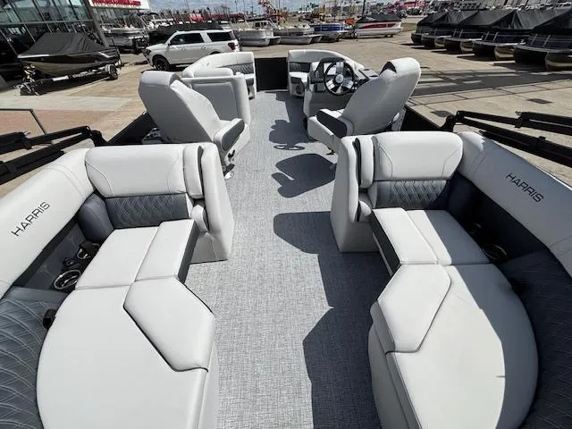 Slide: The Image of 2025 Harris Sunliner 230 pontoon boat interior with luxurious seating and modern design. - 20
