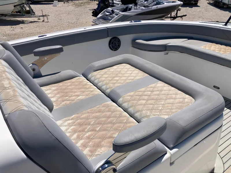 Slide: The Image of Luxurious seating on 2014 Insetta i45C boat with quilted upholstery and armrests. - 19