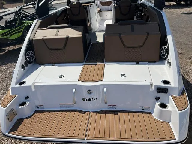 Slide: The Image of 2024 Yamaha Boats 222SD, rear view, showcasing spacious seating and sleek design. - 3