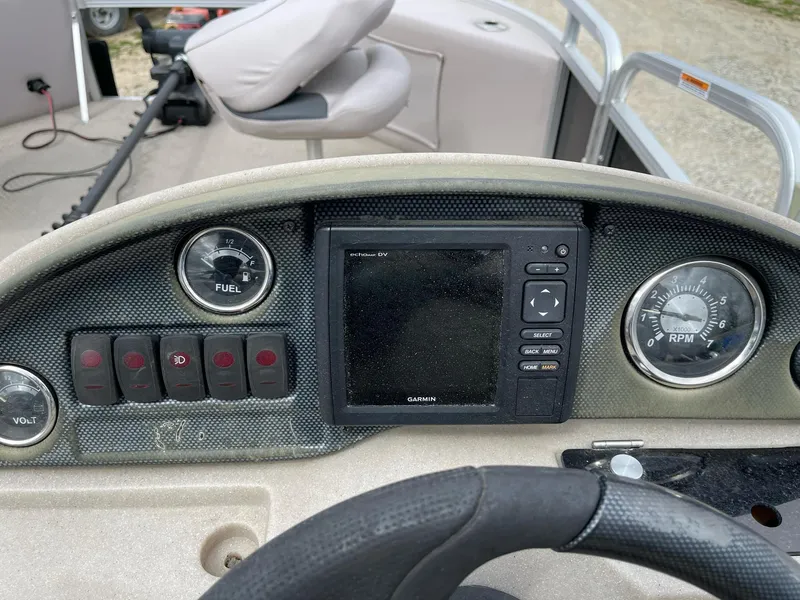 Slide: The Image of Dashboard of 2014 Grand Island 2085 QF boat with gauges and controls. - 11