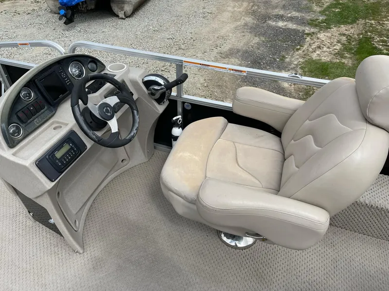 Slide: The Image of Captain's chair and helm of 2014 Grand Island 2085 QF pontoon boat. - 14