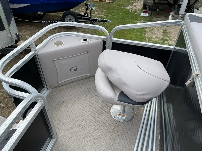 Slide: The Image of 2014 Grand Island 2085 QF boat interior with swivel seat and railing. - 8