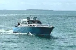 Slide: The Image of Cruising with hardtop hatches open - 3