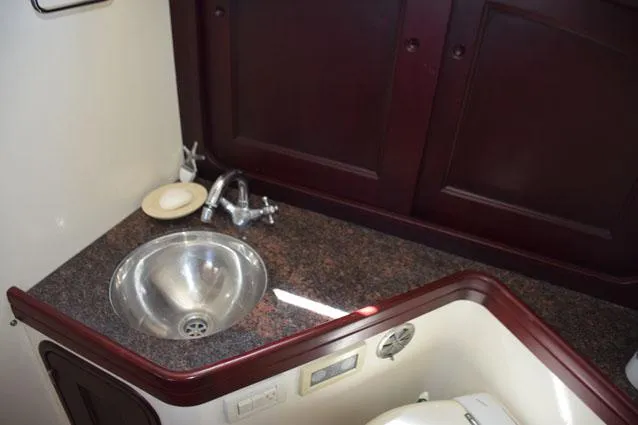 Slide: The Image of Granite vanity with sink in galley - 41