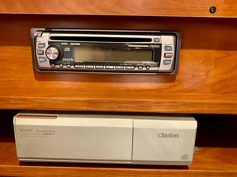 Slide: The Image of Clarion stereo system in 2006 Rinker 360 Fiesta Vee boat interior. - 36