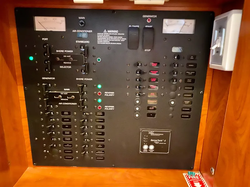 Slide: The Image of Electrical control panel on a 2006 Rinker 360 Fiesta Vee boat. - 37
