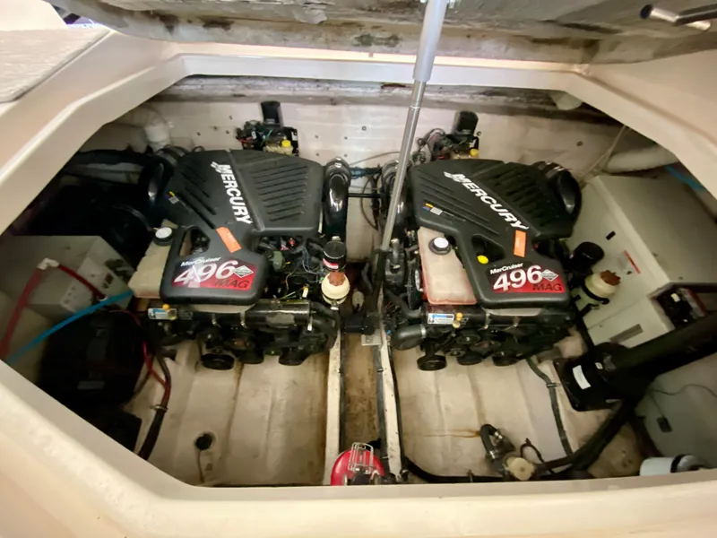 Slide: The Image of 2006 Rinker 360 Fiesta Vee engine compartment with twin MerCruiser 496 MAG engines. - 39