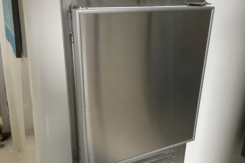 Slide: The Image of Stainless steel panel on a 1977 Bertram 42 Motor Yacht interior. - 22