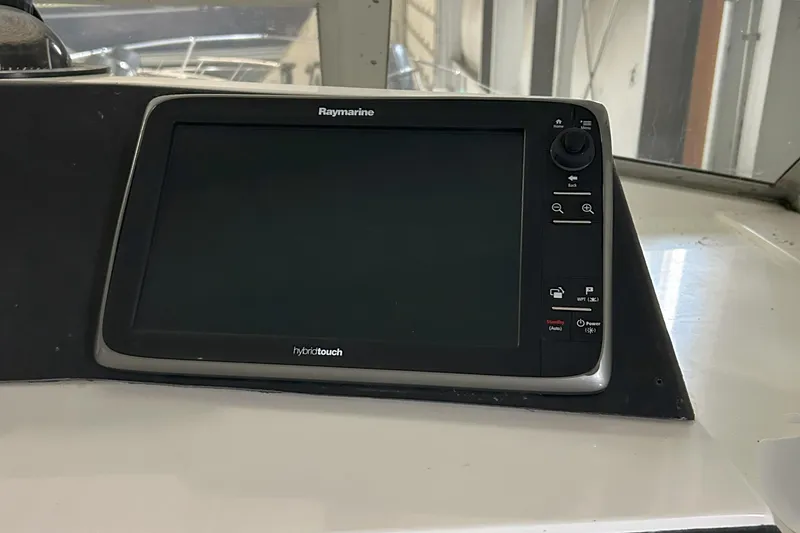 Slide: The Image of Raymarine HybridTouch display on 1977 Bertram 42 Motor Yacht dashboard. - 29