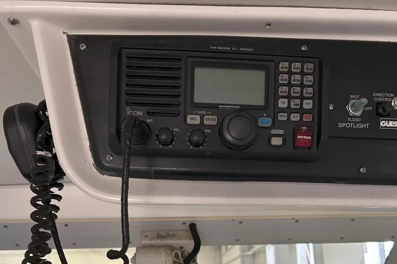Slide: The Image of VHF marine radio on 1977 Bertram 42 Motor Yacht dashboard. - 30