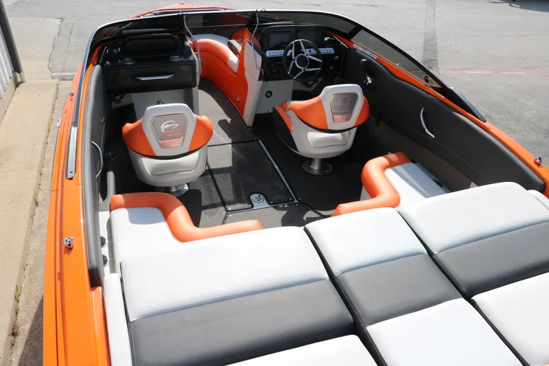 Slide: The Image of 2022 Crownline 220 SS LPX boat interior with orange and white seating. - 13