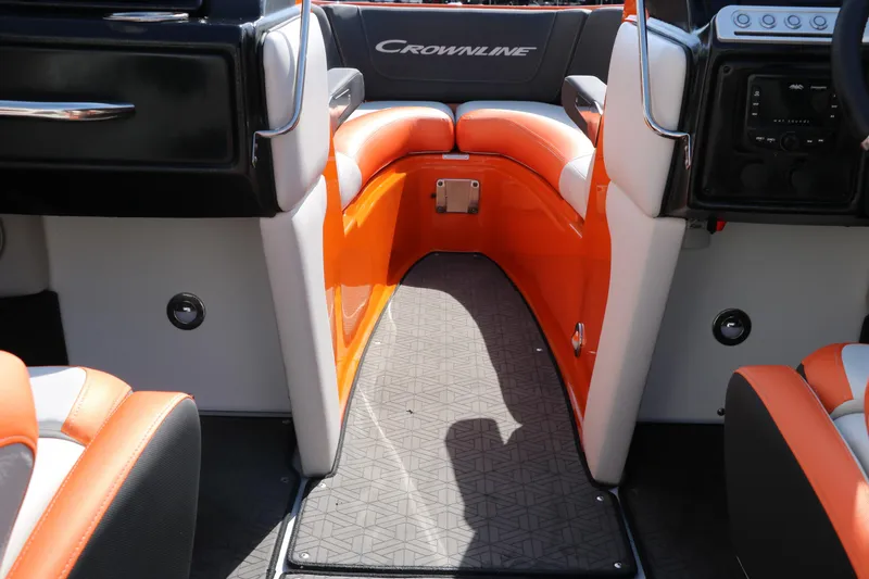 Slide: The Image of 2022 Crownline 220 SS LPX boat interior with orange and gray seating. - 23