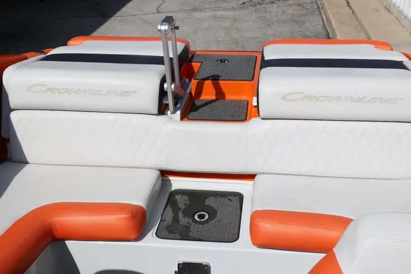 Slide: The Image of 2022 Crownline 220 SS LPX boat interior with orange and white seating. - 26