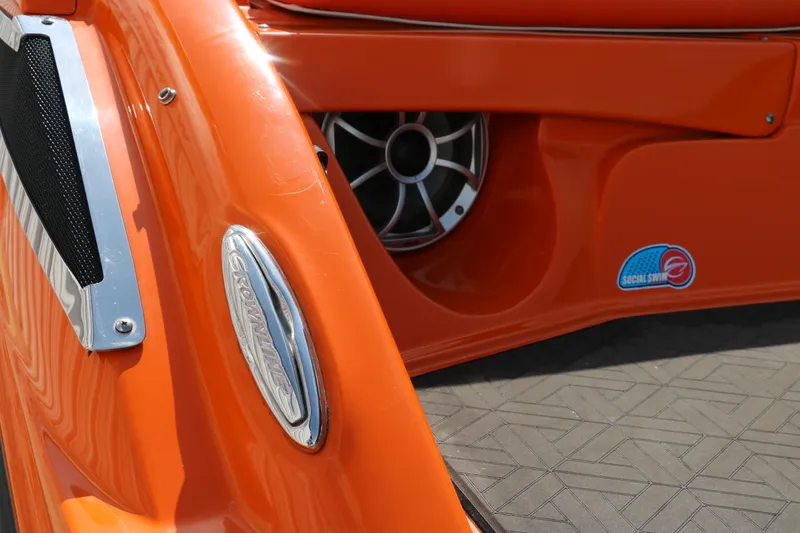 Slide: The Image of Orange 2022 Crownline 220 SS LPX boat detail with speaker and logo. - 30
