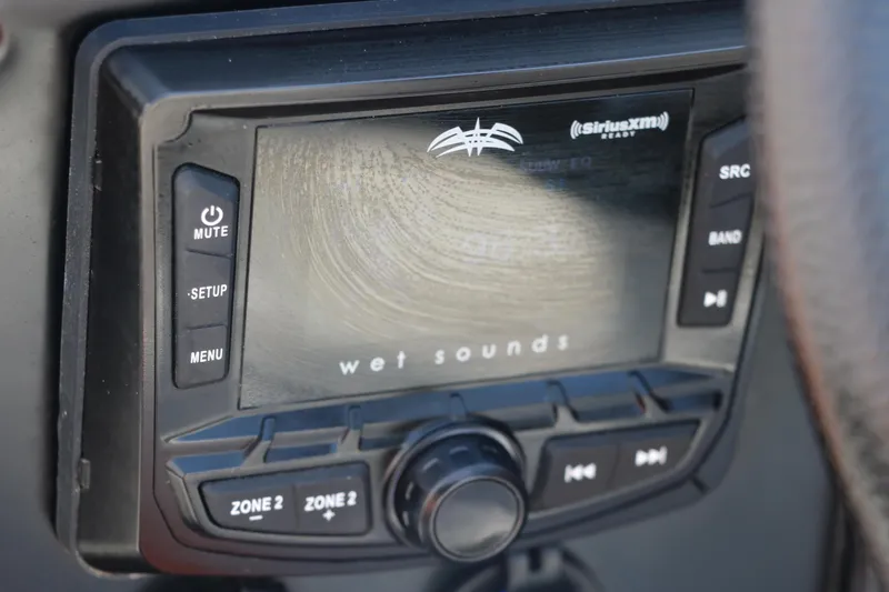 Slide: The Image of Wet Sounds audio system in 2022 Crownline 220 SS LPX boat dashboard. - 33