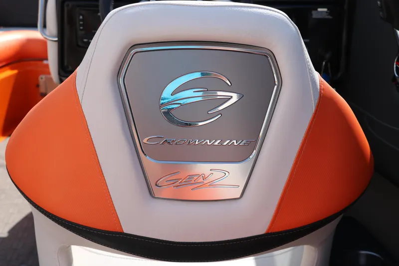 Slide: The Image of 2022 Crownline 220 SS LPX boat seat with logo and orange accents. - 34