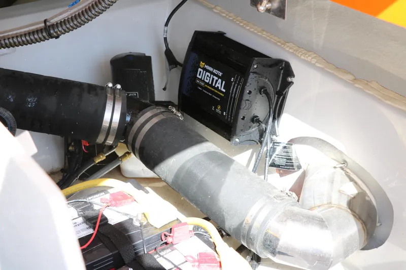 Slide: The Image of Engine compartment of 2022 Crownline 220 SS LPX with digital components and wiring. - 38