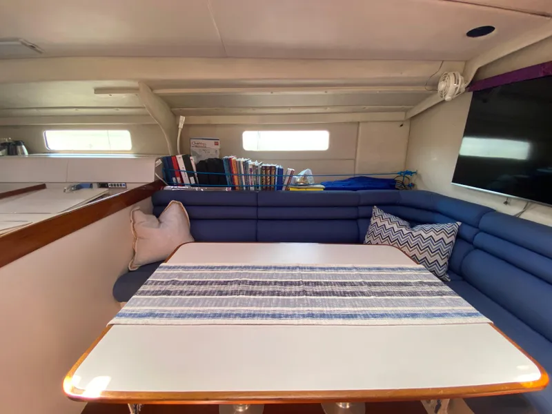 Slide: The Image of Huge Portlights flood the Saloon - 11