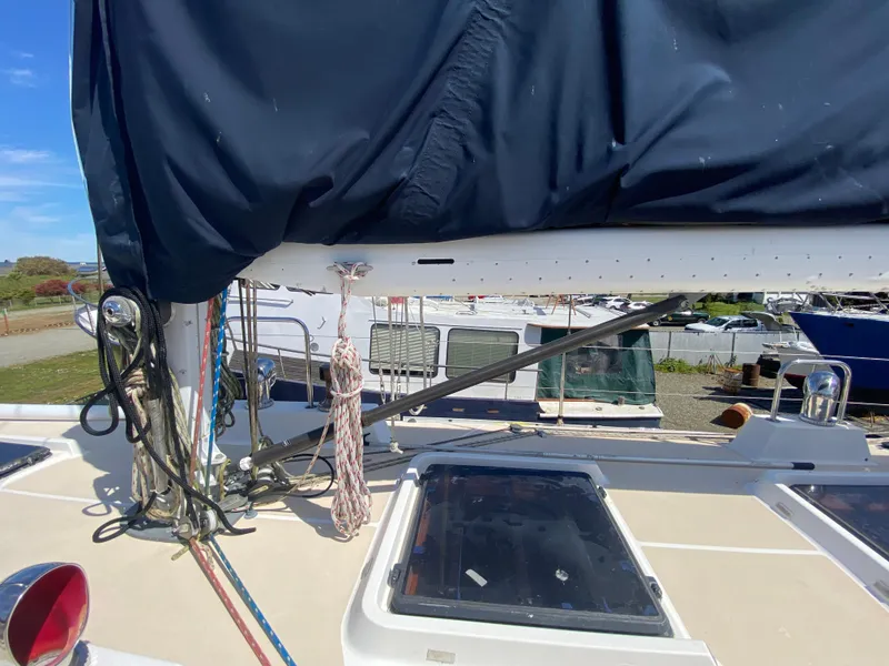 Slide: The Image of Sundeer 56 sailboat deck with ropes and covered boom, 1995 model. - 31