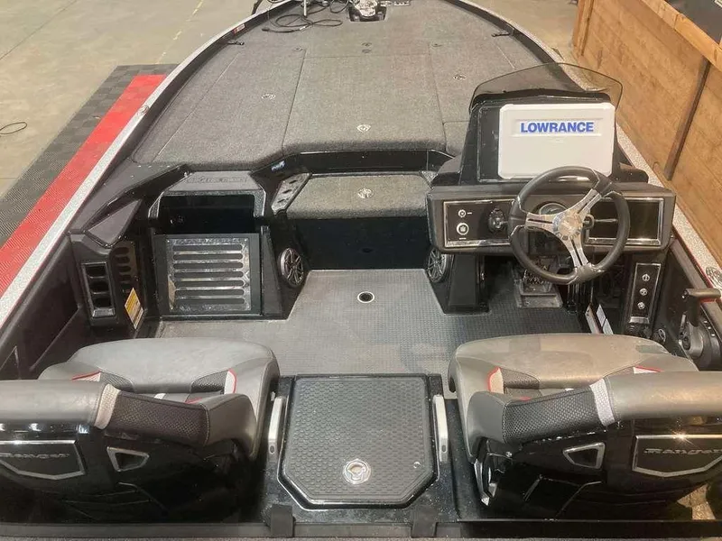 Slide: The Image of 2024 Ranger Z520R boat interior with Lowrance system and dual seats. - 6
