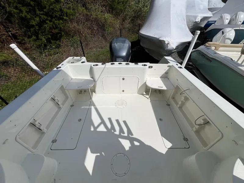 Slide: The Image of 2008 Sailfish 2360 WAC boat deck, spacious layout, clean and well-maintained. - 7