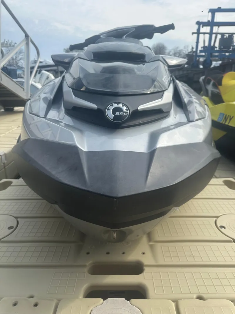 Slide: The Image of 2021 Sea-Doo GTX Limited 300 jet ski on dock, front view. - 3