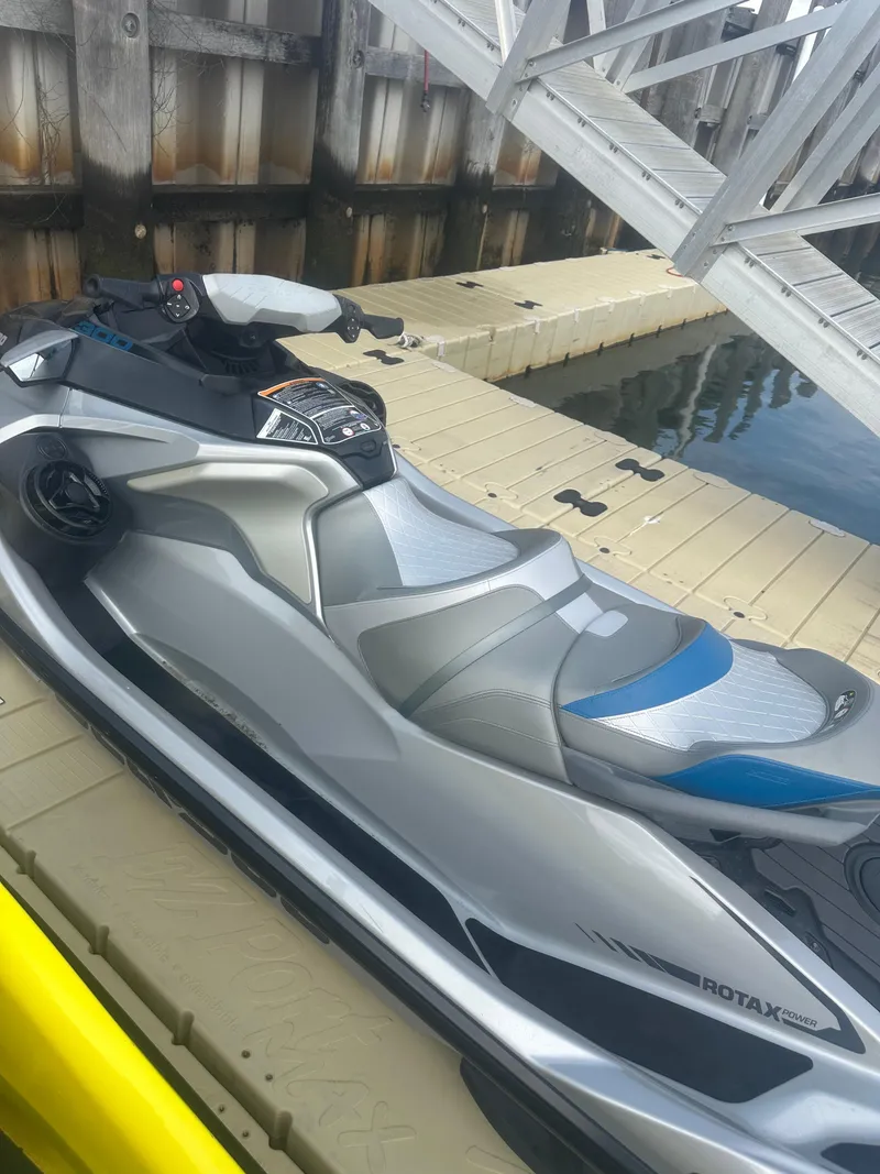 Slide: The Image of 2021 Sea-Doo GTX Limited 300 jet ski docked on a wooden pier. - 9
