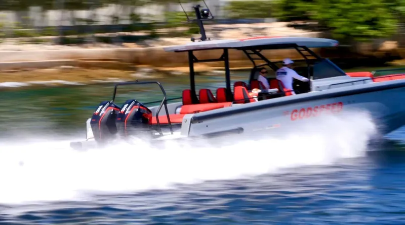 The Image of 2022 Axopar Brabus Shadow 900 ST speeding on water with dual engines. - 0