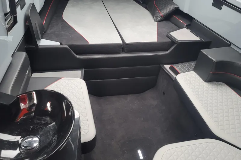 Slide: The Image of Luxurious interior of 2022 Axopar Brabus Shadow 900 ST with modern seating and sleek design. - 14