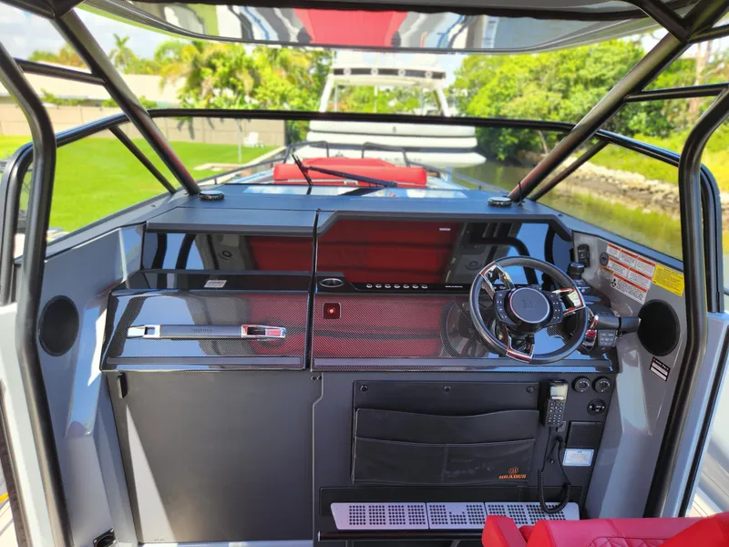 Slide: The Image of 2022 Axopar Brabus Shadow 900 ST cockpit with sleek design and modern controls. - 8